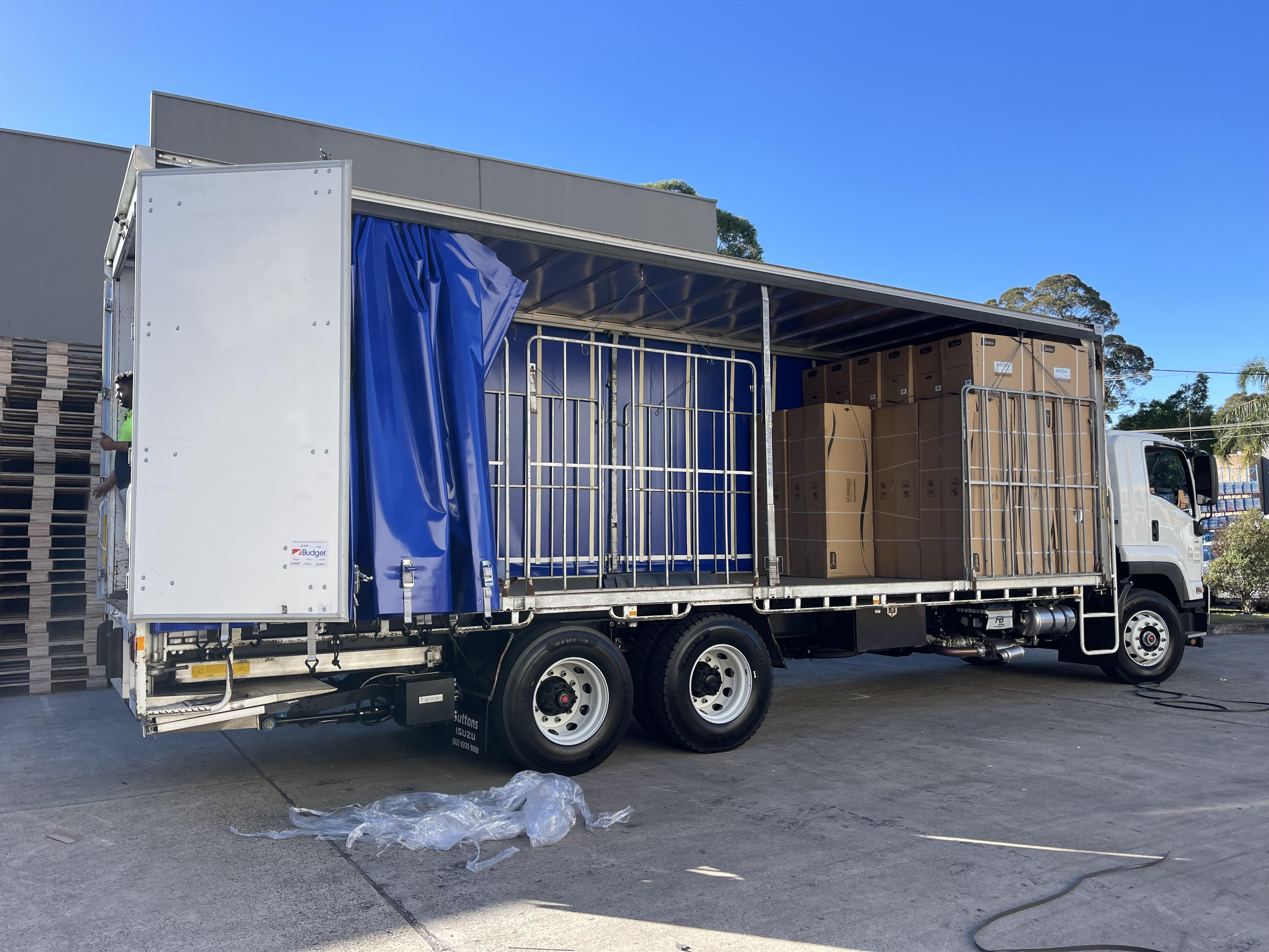 Fully loaded Quick Cargo 12 tonne truck, loading freight for same day interstate freight transport